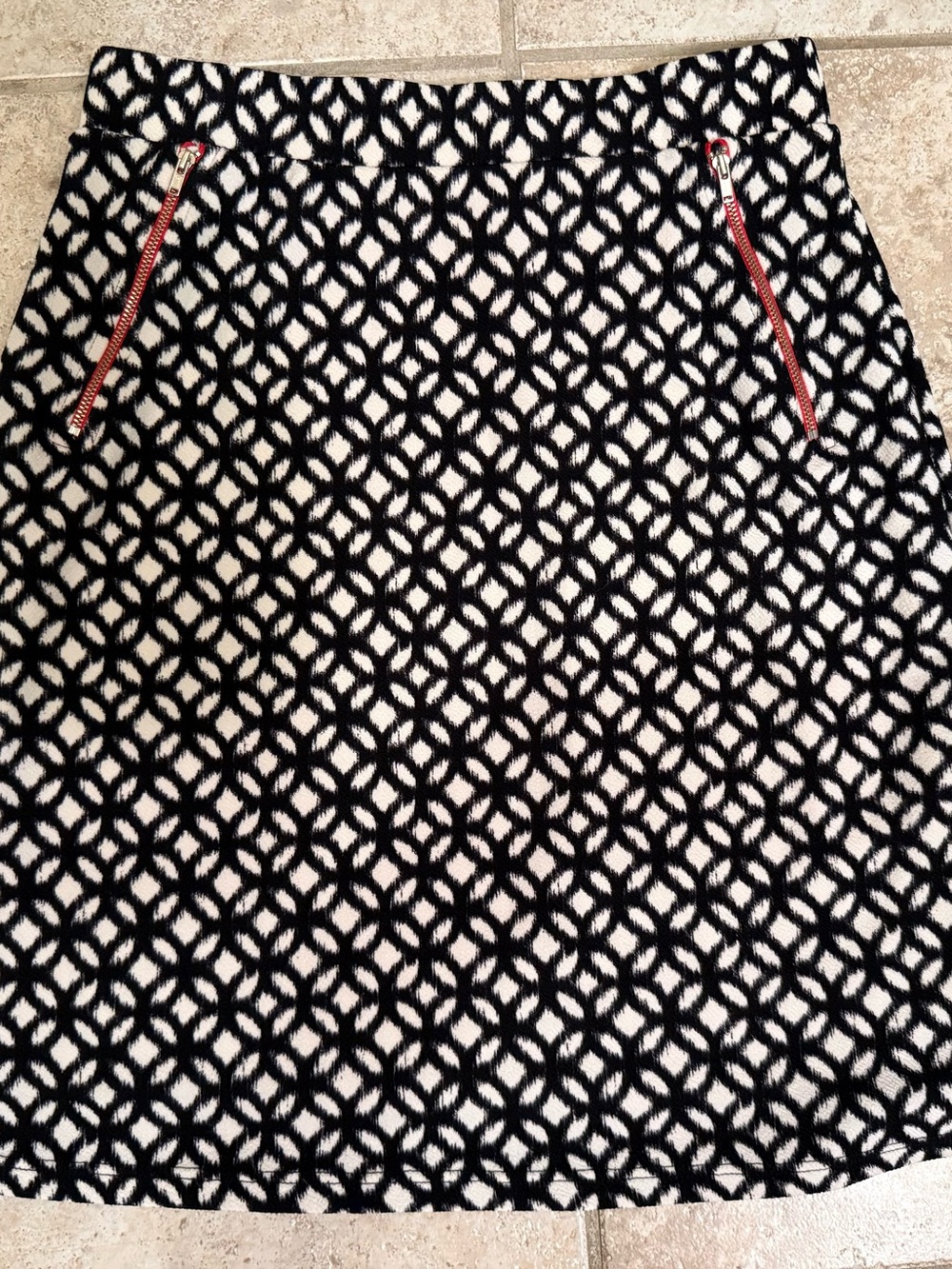 Le Lis Black and White Geometric Mini Skirt with Red Zip Accents 21 in.